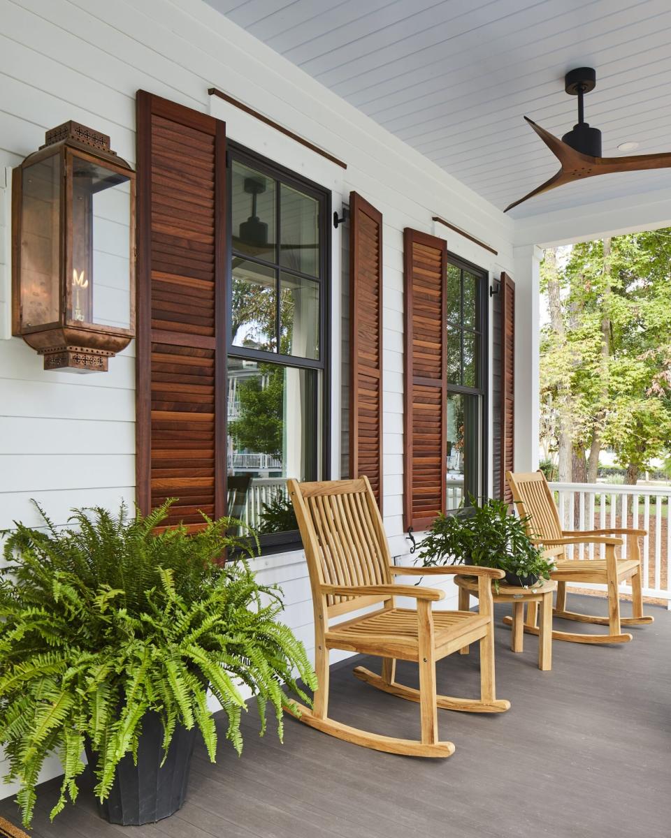 front porch with rocking chairs on porch of house in Habersham southern living inspired community