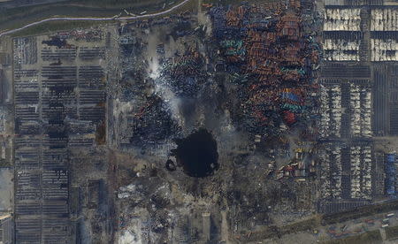 An aerial picture of the site of explosions at the Binhai new district, Tianjin, China, August 16, 2015. REUTERS/Stringer