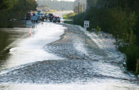 The roadway of Highway 301 is covered by flood waters caused by Hurricane Florence in Latta, South Carolina, U.S., September 17, 2018. REUTERS/Jason Miczek