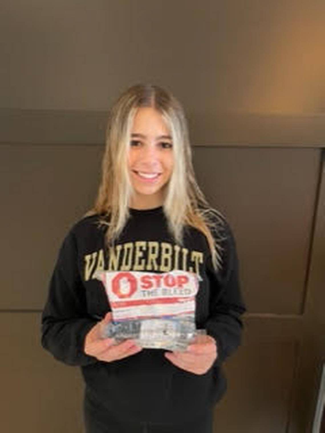Ashley Freedland, a senior at Cypress Bay High School in Weston, with a Stop the Bleed kit.