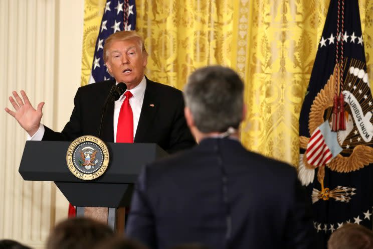 Trump answers a question from CNN's Jim Acosta during a news conference in the East Room at the White House on Thursday. (Mark Wilson/Getty Images)