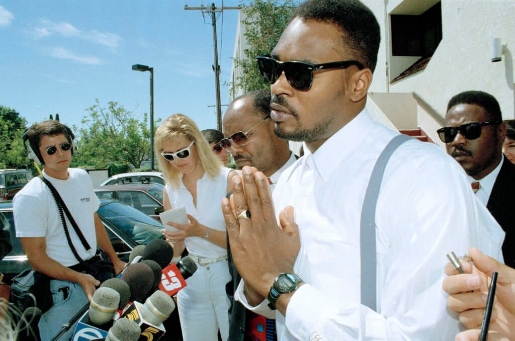 Rodney King makes a point at a news conference, on June 2, 1994 in Santa Ana, Calif. Jurors who had earlier ordered the city of Los Angeles to pay King $3.8 million for his beating declined to order punitive damages against any of the police officers involved in the March 1991 video taped beating. (AP Photo/Chris Martinez, File)