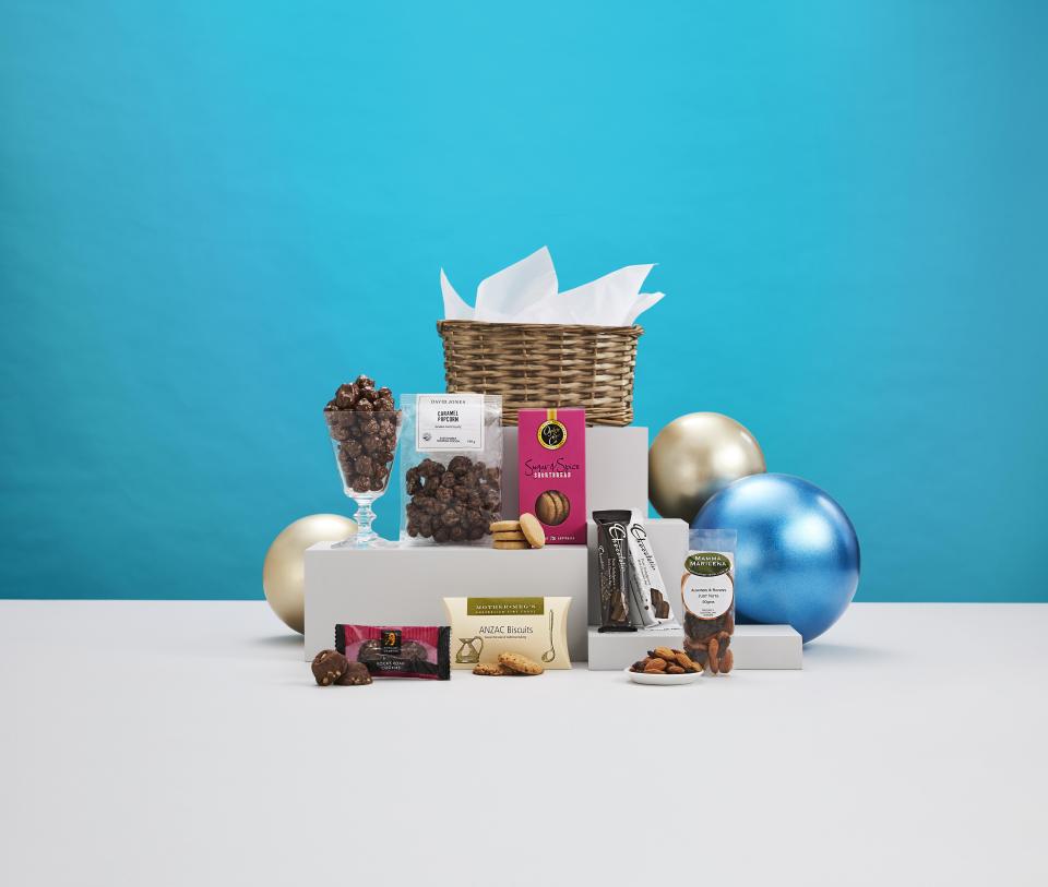 <p>This Snack Box Hamper has an assortment of biscuits, chocolates and nuts - $49.95 - David Jones</p>