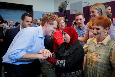 U.S. Rep. Kennedy III and his wife Lauren greet supporters in Boston