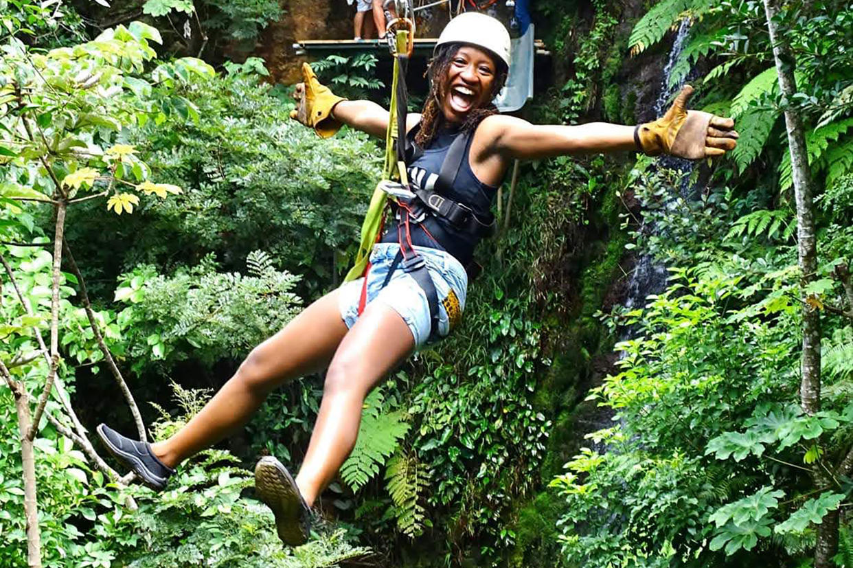 A member of Vibe Tribe Adventures zip-lines in Costa Rica. (Courtesy Vibe Tribe Adventures)