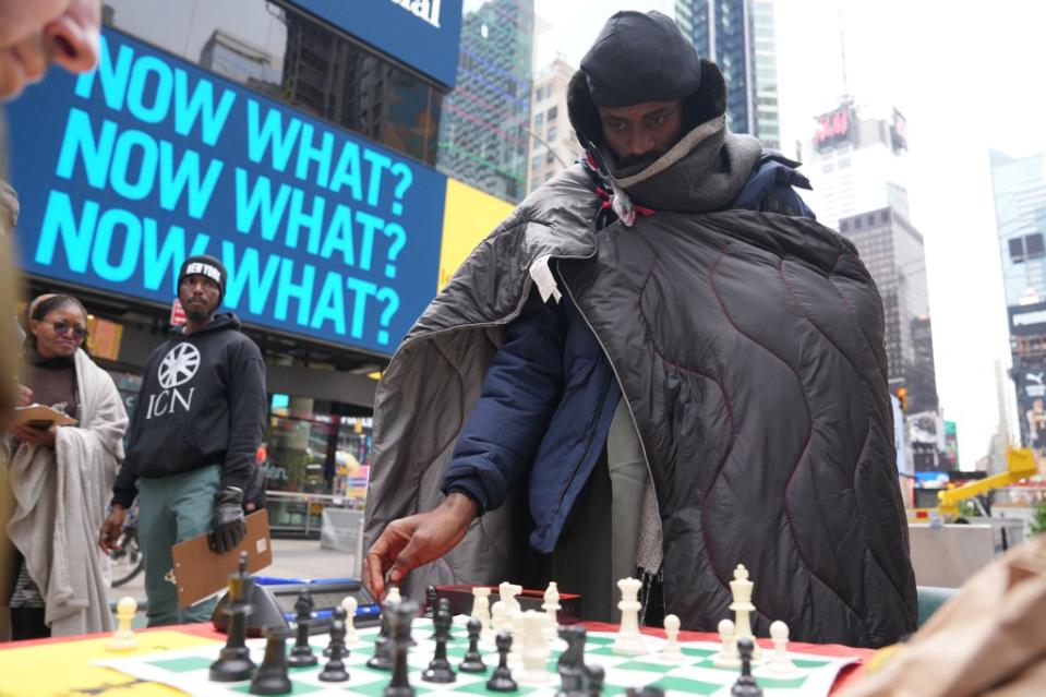 Tunde felt the cold NYC temperatures during his chess marathon. James Keivom