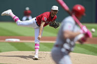 Cleveland Guardians starting pitcher Tanner Bibee delivers to Los Angeles Angels' Hunter Renfroe during the first inning of a baseball game, Sunday, May 14, 2023, in Cleveland. (AP Photo/David Dermer)