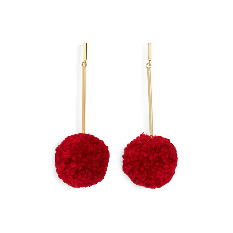 <a rel="nofollow noopener" href="https://www.bando.com/collections/new/products/pom-pom-earrings-red" target="_blank" data-ylk="slk:Pom Pom Earrings, Ban.do, $75"Red is everywhere this season, and as much as I adore the bold hue, I find myself opting for little pops of color instead of a gorgeous boot or statement coat. These earrings are just the right amount of fun and sexy, and I'm loving their '70s vibe." —Samantha McDonald, News Editor;elm:context_link;itc:0;sec:content-canvas" class="link ">Pom Pom Earrings, Ban.do, $75<p>"Red is everywhere this season, and as much as I adore the bold hue, I find myself opting for little pops of color instead of a gorgeous boot or statement coat. These earrings are just the right amount of fun and sexy, and I'm loving their '70s vibe."</p> <p>—<em>Samantha McDonald, News Editor </em></p> </a>