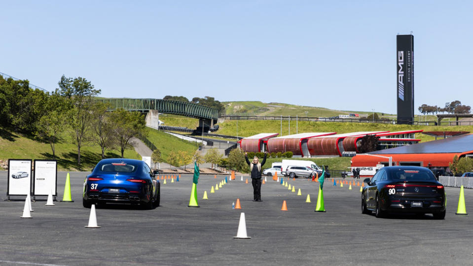 At an AMC Driving Academy program, students first get comfortable with high-speed blasts, followed by full-stop braking, at a makeshift drag strip.