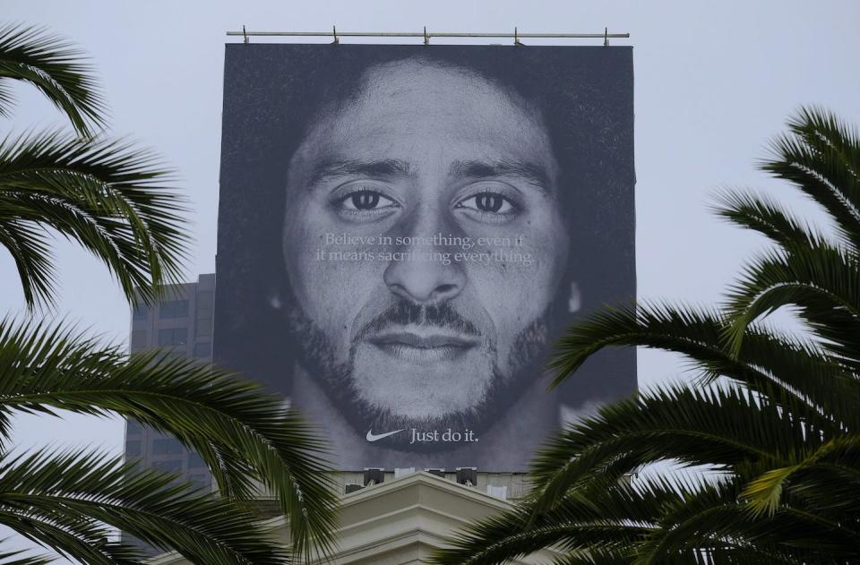 Colin Kaepernick’s face in a Nike ad in 2018, in San Francisco. (AP Photo/Eric Risberg)