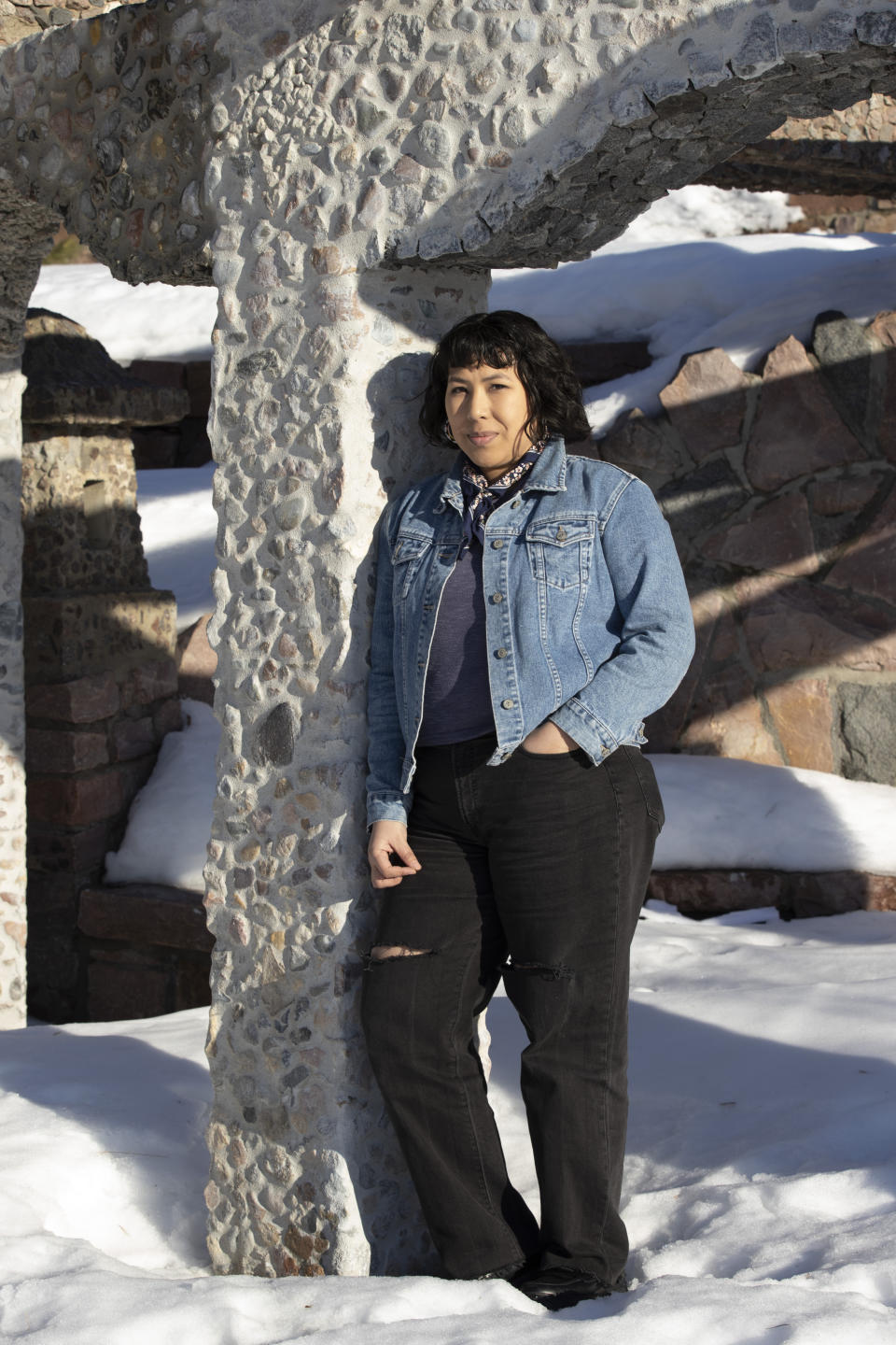 April Matson stands for a portrait in Sioux Falls, S.D., on Wednesday, Feb. 8, 2023. A few months after South Dakota banned abortion in 2022, Matson drove more than nine hours to take a friend to a Colorado clinic to get the procedure. The trip brought back difficult memories of Matson’s own abortion at the same clinic in 2016. The former grocery store worker and parent of two couldn’t afford a hotel and slept in a tent near a horse pasture — bleeding and in pain. (AP Photo/Josh Jurgens)