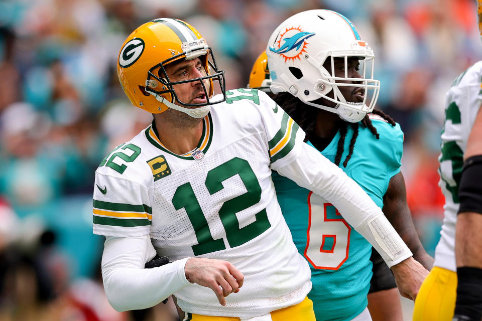 MIAMI GARDENS, FLORIDA - DECEMBER 25: Aaron Rodgers #12 of the Green Bay Packers reacts after throwing a pass against the Miami Dolphins during the first half of the game at Hard Rock Stadium on December 25, 2022 in Miami Gardens, Florida. (Photo by Megan Briggs/Getty Images)