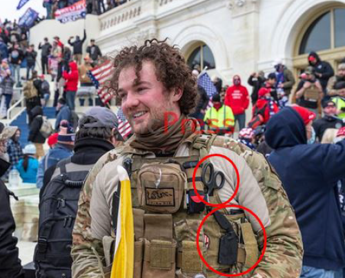 The FBI used this photograph, captured from video, in the arrest warrant affidavit they filed against Robert Morss, an Allegheny County man, who appears in this photograph to have a pair of scissors and a knife in his vest on the day of the Capitol riot. The FBI circled those items in red.