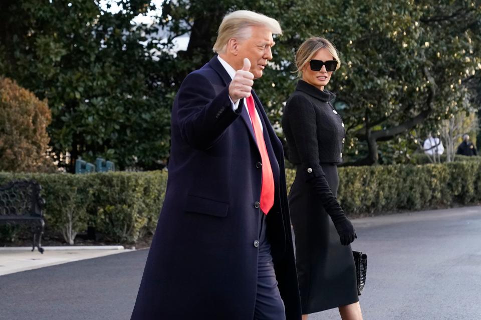 President Donald Trump and first lady Melania Trump head for Marine One on the South Lawn on Jan. 20, their last morning in the White House.