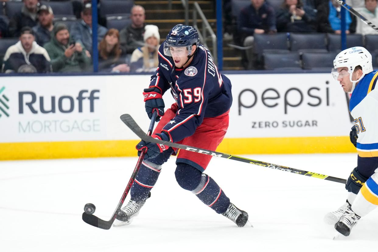 Oct 6, 2022; Columbus, Ohio, United States; Columbus Blue Jackets forward Yegor Chinakhov (59) makes a shot on the goal during the first period of the preseason game against the St. Louis Blues at Nationwide Arena. Mandatory Credit: Joseph Scheller-The Columbus Dispatch 