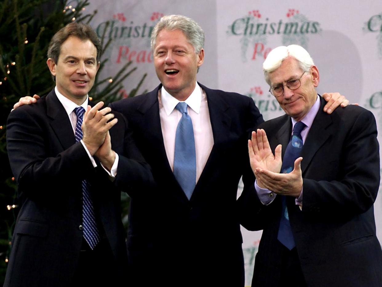 Bill Clinton is congratulated by British Prime Minister Tony Blair and Deputy First Minister for Northern Ireland Seamus Mallon after delivering a speech at Belfast's Odyssey Centre December 13, 2000: REUTERS