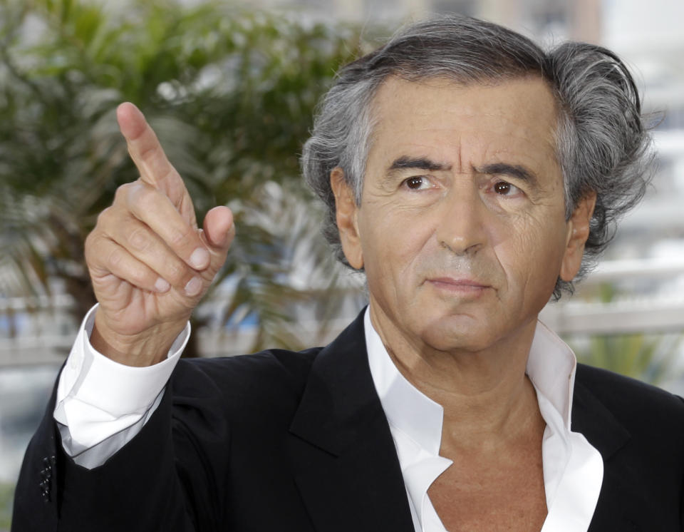 Director Bernard-Henry Levy poses during a photo call for The Oath of Tobruk at the 65th international film festival, in Cannes, southern France, Friday, May 25, 2012. (AP Photo/Lionel Cironneau)