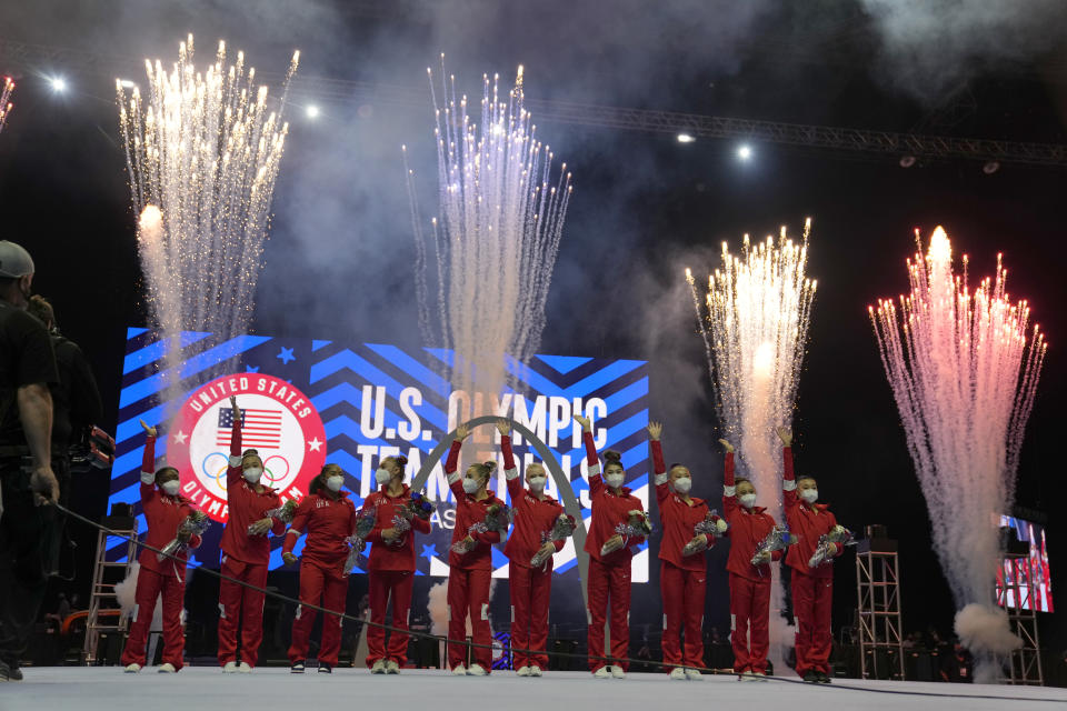 Members of the US Women's Olympic Gymnastic Team and alternates celebrate after the women's U.S. Olympic Gymnastics Trials Sunday, June 27, 2021, in St. Louis. (AP Photo/Jeff Roberson)