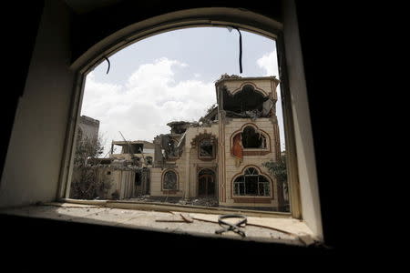 The house of Brigadier Khaled al-Anduli, an army commander loyal to the Houthi movement, is seen after it was hit by Saudi-led air strikes in Yemen's capital Sanaa July 6, 2015. REUTERS/Khaled Abdullah