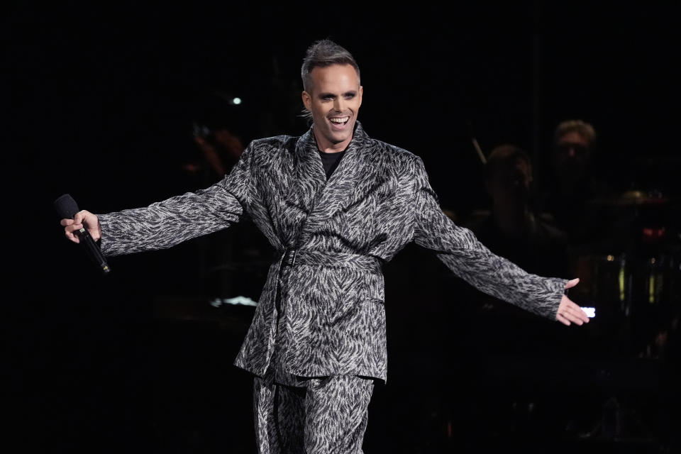 Justin Tranter appears on stage during the 66th annual Grammy Awards on Sunday, Feb. 4, 2024, in Los Angeles. (AP Photo/Chris Pizzello)