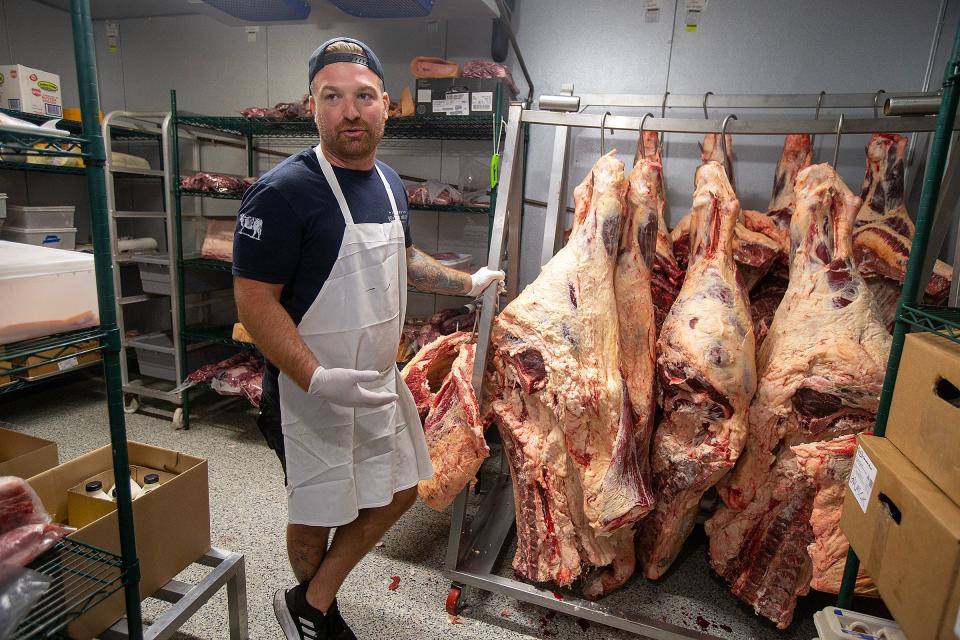 Doug Palmer, owner of Palmer's Quality Meats, a whole animal butcher shop in Neptune City, talks about the business in the freezer of his shop.