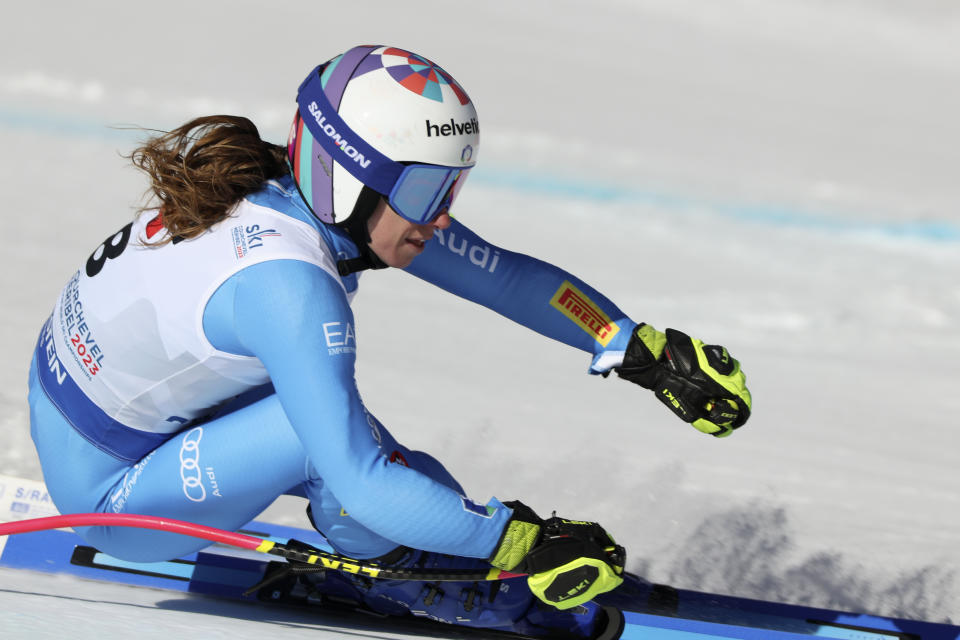 Italy's Marta Bassino speeds down the course during an alpine ski, women's World Championships super G, in Meribel, France, Wednesday, Feb. 8, 2023. (AP Photo/Alessandro Trovati)