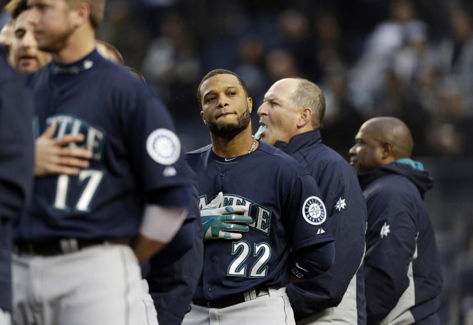Seattle Mariners' Robinson Cano looks stands during the playing of the national anthem before a baseball game against the New York Yankees, Tuesday, April 29, 2014, in New York. (AP Photo)