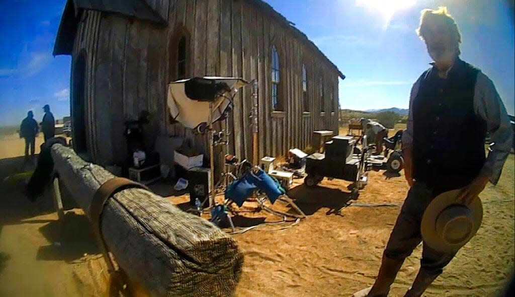 In this image from video released by the Santa Fe County Sheriff's Office, Alec Baldwin stands in costume and speaks with investigators following a fatal shooting on a movie set in Santa Fe, N.M. In a motion filed Tuesday, Feb. 07, 2023, in Santa Fe-based district court, defense attorneys for Baldwin are seeking to disqualify the special prosecutor in the case against him stemming from the shooting of a cinematographer on the film set.