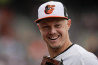 Baltimore Orioles first baseman Ryan Mountcastle smiles as he walks to the dugout during the fifth inning of a baseball game against the Minnesota Twins, Wednesday, April 17, 2024, in Baltimore. The Orioles won 4-2. (AP Photo/Jess Rapfogel)