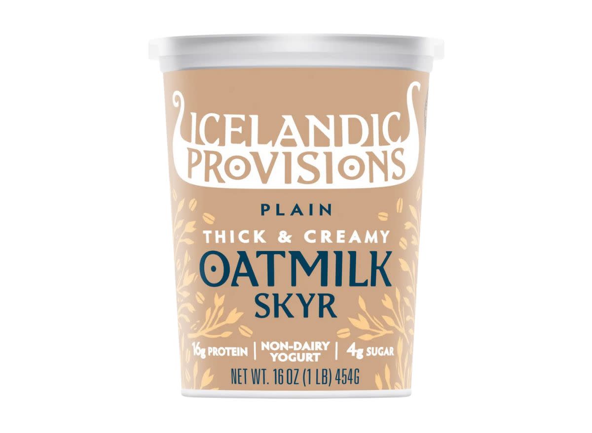 container of oatmilk skyr yogurt on a white background