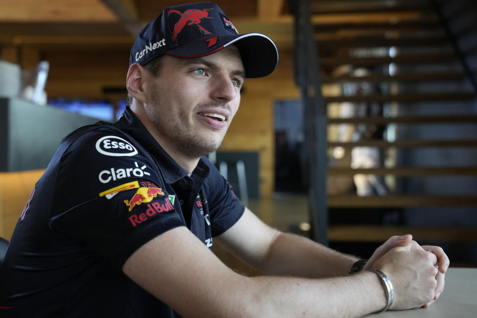 Red Bull driver Max Verstappen of the Netherlands talks to a reporter during an interview with the Associated Press at the Hungaroring racetrack in Mogyorod, near Budapest, Hungary, Thursday, July 28, 2022. The Hungarian Formula One Grand Prix will be held on Sunday. (AP Photo/Darko Bandic)