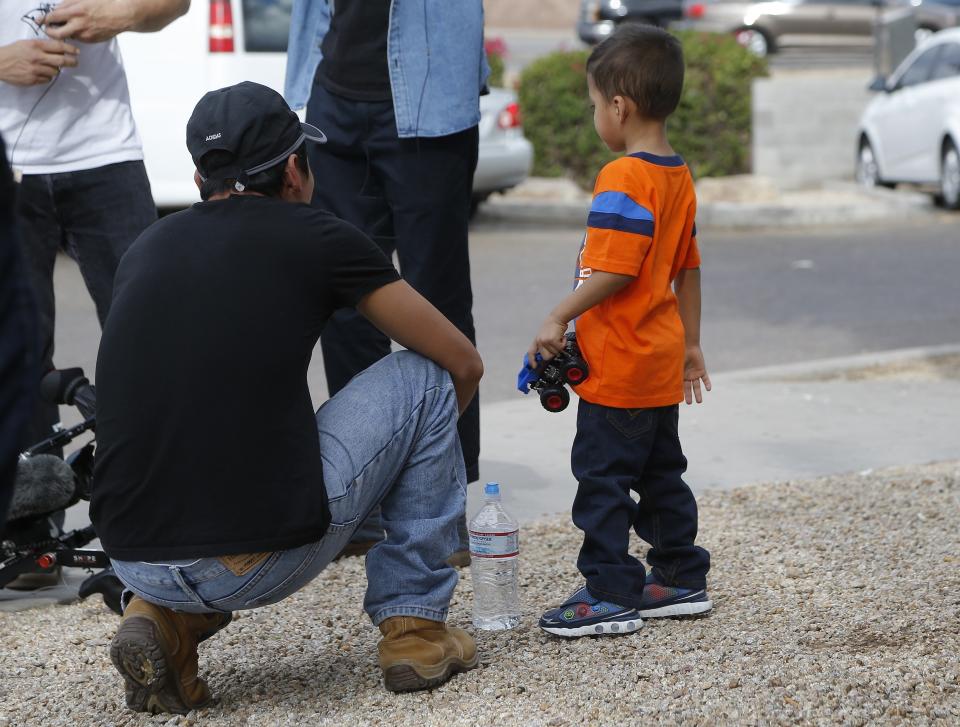 <span class="s1">Jose and his 3-year-old son, Jose Jr., after they were reunited on July 10 in Phoenix. (Photo: Ross D. Franklin/AP)</span>