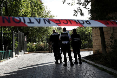 Police secure a street near the scene where French soliders were hit and injured by a vehicle in the western Paris suburb of Levallois-Perret, France, August 9, 2017. REUTERS/Benoit Tessier