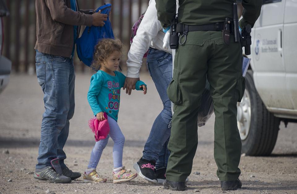 A young child is seen as she along with other migrants are processed by Border Patrol agents after being detained when they crossed illegally into the United States from Mexico on June 2, 2019 in Sunland Park, New Mexico.