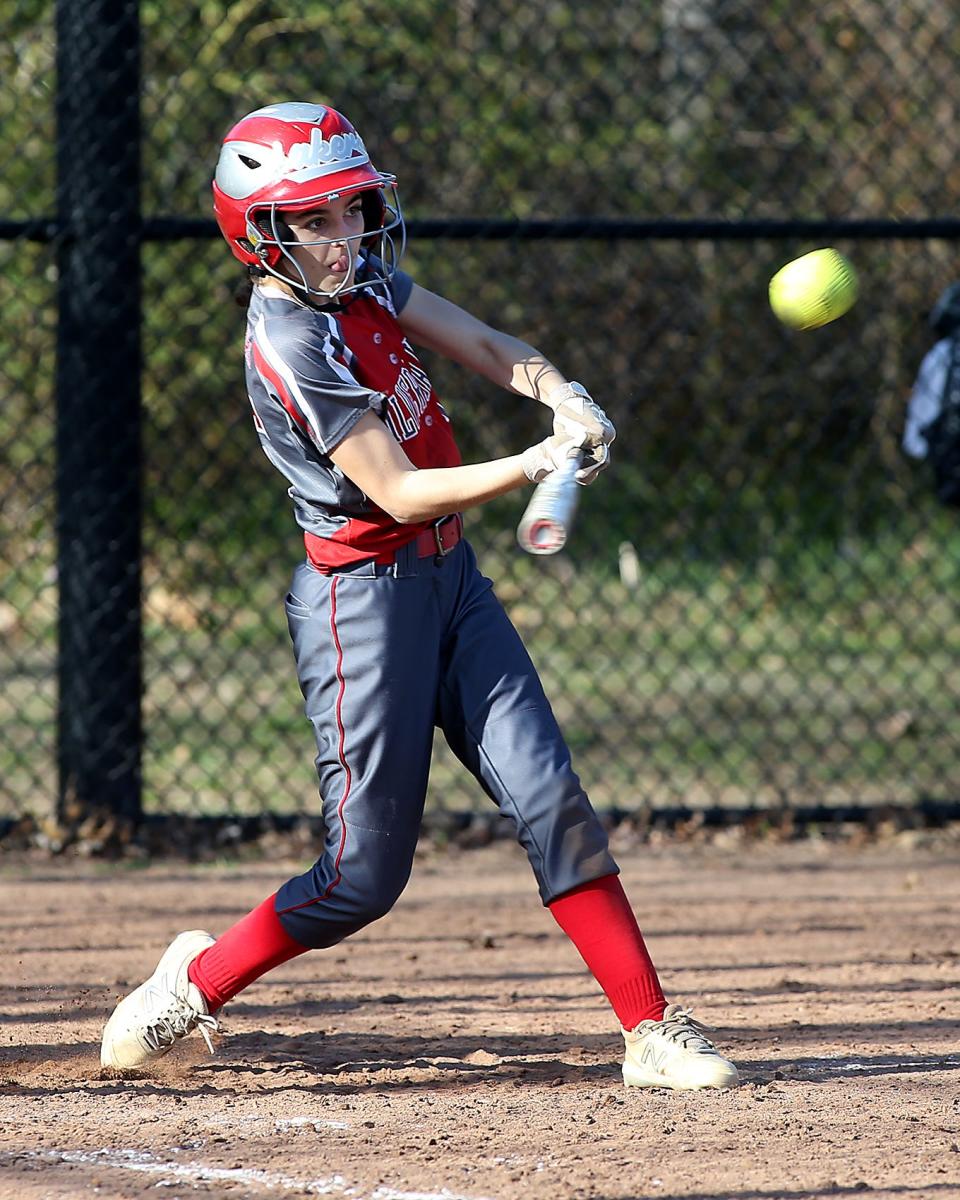 Silver Lake's Jayme Carr drives in a run with a single in the top of the fifth inning to cut the Hingham lead to 11-7 during their game against Hingham at Hingham High on Thursday, April 12, 2022. 