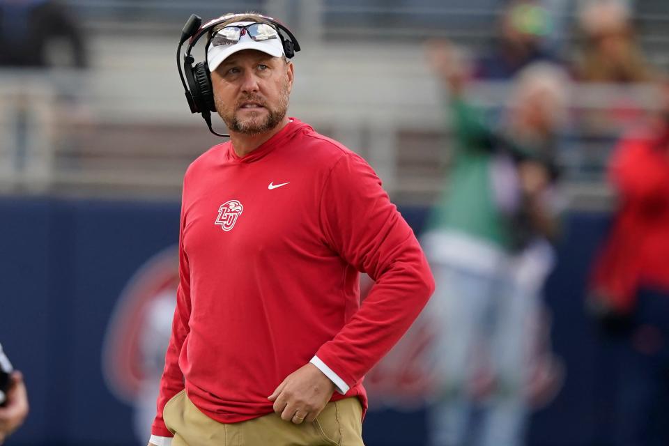 Liberty head coach Hugh Freeze looks towards his team during the second half of an NCAA college football game against Mississippi in Oxford, Miss., Saturday, Nov. 6, 2021. Mississippi won 27-14. (AP Photo/Rogelio V. Solis)