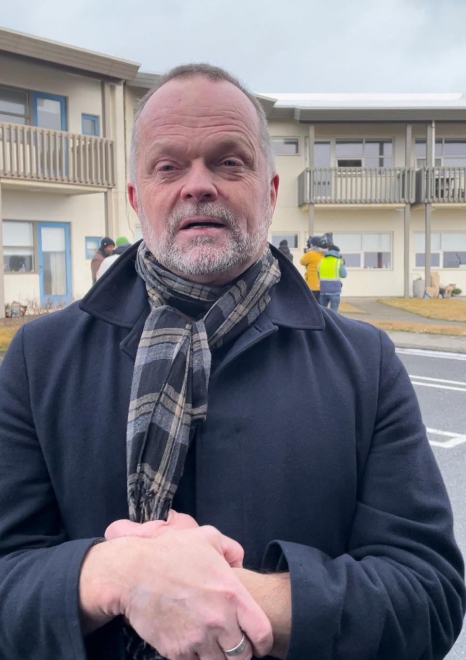 Snorri Valsson Iceland’s spokesperson for tourism stands in front of a retirement home damaged by the earthquake (Barney Davis)