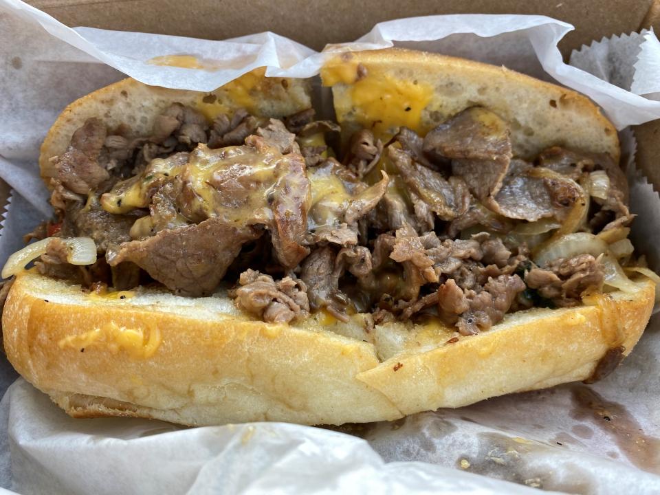 A cheesesteak with onions at The German Butcher in Lacey.