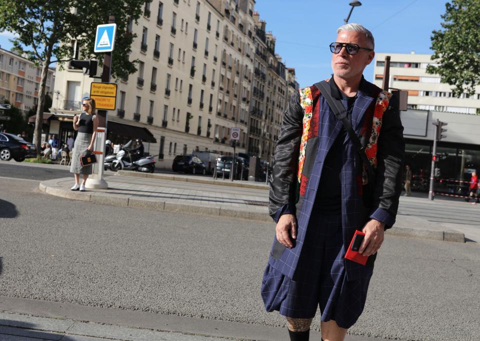 <h1 class="title">Nick Wooster in a Louis Vuitton coat</h1><cite class="credit">Photographed by Phil Oh</cite>