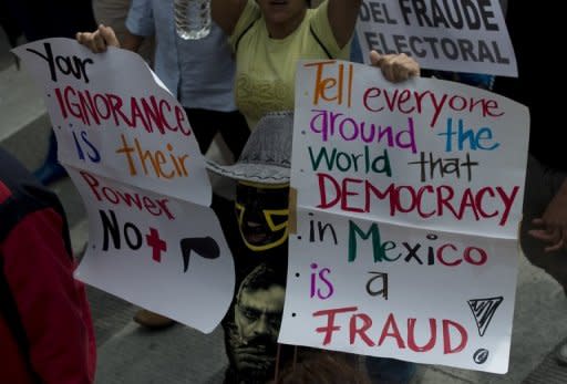 Members of the "YoSoy132" movement march to Zocalo Square in Mexico City on July 7 to protest against the presidential election victory of Enrique Pena Nieto. Although the elections were clean, "the electoral process was not fair," says Autonomous University of Mexico (UNAM) analyst Hector Tajonar