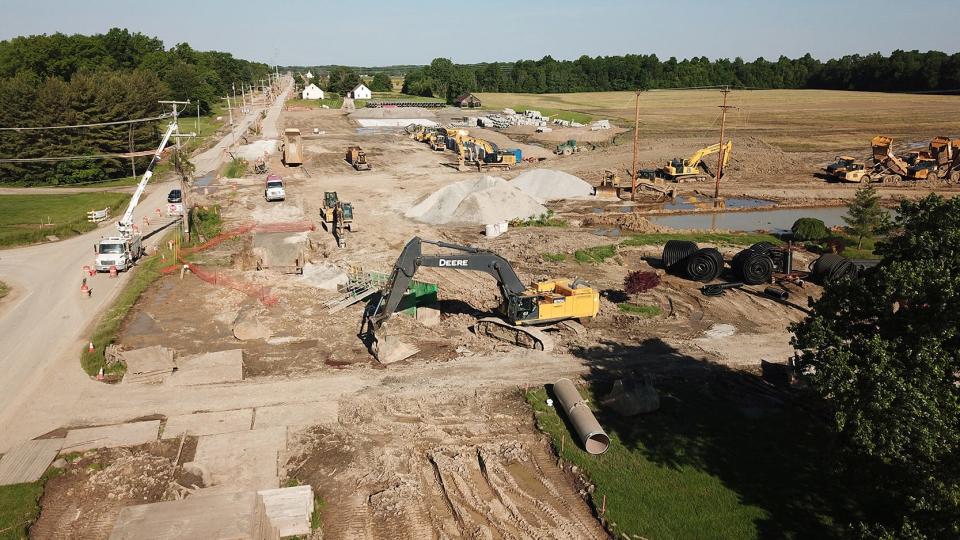 Development continues in the area around the Intel chip manufacturing facility near New Albany. This view looks west, with Jug Street being rebuilt. Photographed May 30. President Joe Biden's signing of the CHIPS Act means work will continue.