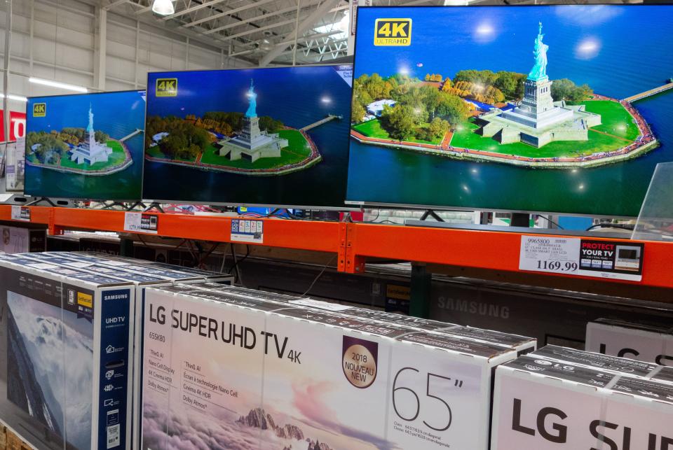 High definition televisions are seen for sale at a Costco store in Washington, DC, September 27, 2018. - A universe of Chinese-made goods found in every American home is now subject to the sprawling tariffs imposed by President Donald Trump, with the brunt of costs to be borne by US consumers, key drivers of the American economy. (Photo by SAUL LOEB / AFP)        (Photo credit should read SAUL LOEB/AFP via Getty Images)