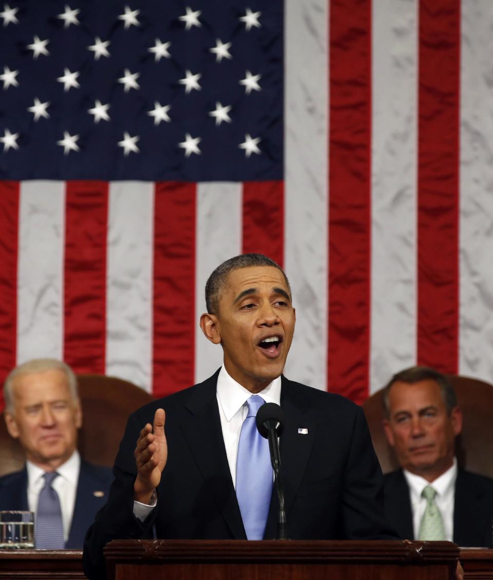 President Barack Obama delivers the State of Union address before a joint session of Congress in the House chamber Tuesday, Jan. 28, 2014, in Washington, as Vice President Joe Biden, and House Speaker John Boehner of Ohio, listen. (AP Photo/Larry Downing, Pool)