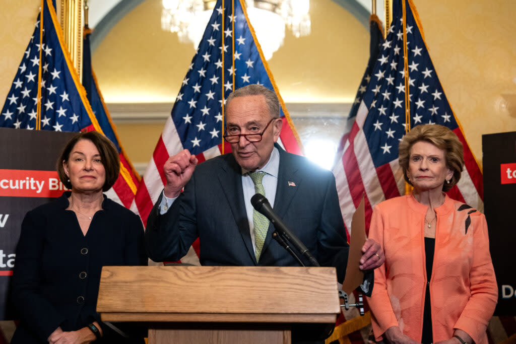 U.S. Senate Majority Leader Chuck Schumer, flanked by Sen. Amy Klobuchar, a Minnesota Democrat, left, and Sen. Debbie Stabenow, a Michigan Democrat, speaks during a news conference to support a border security bill on Wednesday, May 22, 2024. The bill failed on a procedural vote Thursday.