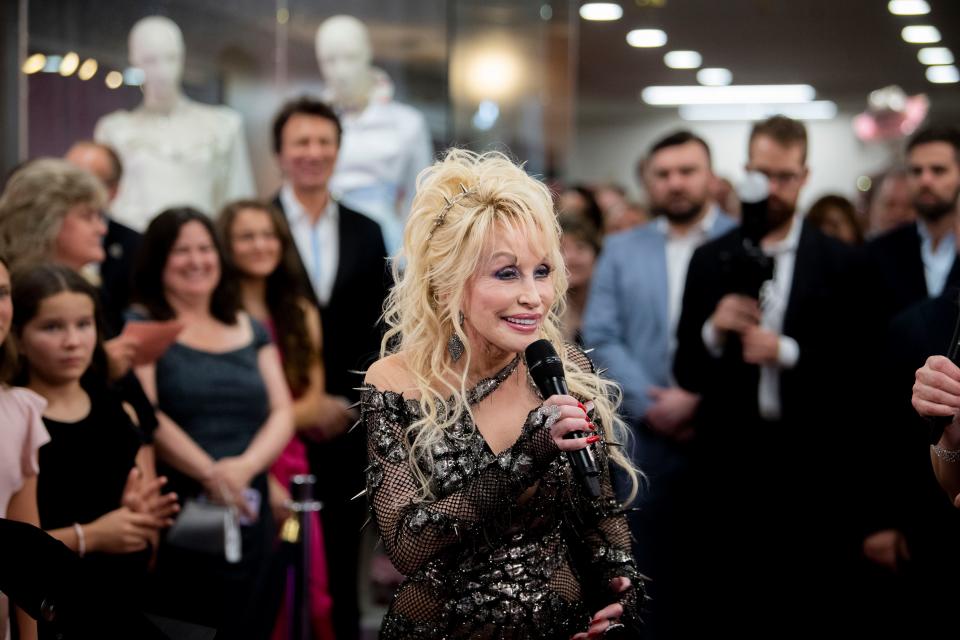 Dolly Parton speaks to the crowd during the opening of the Dolly Parton & the Makers: My Life In Rhinestones fashion exhibition at Lipscomb University in Nashville on Oct. 27.