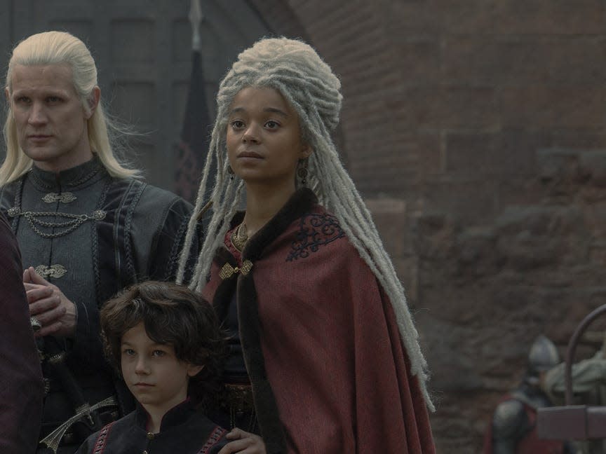 House Targaryen standing in a group in the castle courtyard.