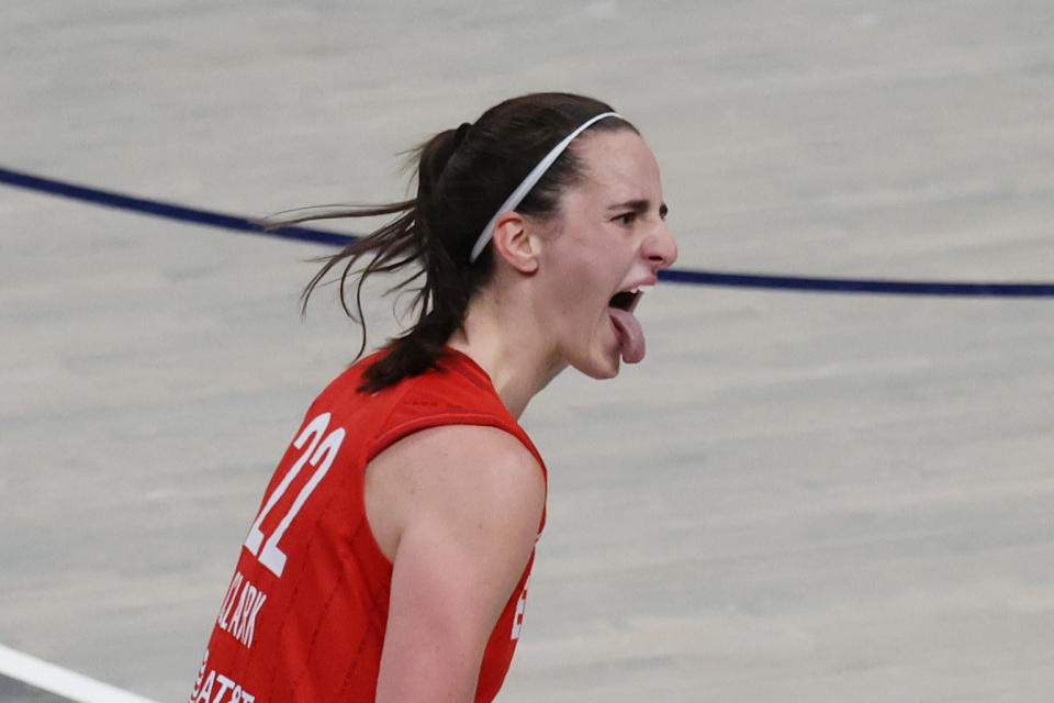 INDIANAPOLIS, IN – AUGUST 16: Indiana Fever defender Caitlin Clark (22) sticks out her tongue as she reacts to a play against the Phoenix Mercury at Gainbridge Fieldhouse on August 16, 2024 in Indianapolis, Indiana. (Photo by Brian Spurlock/Icon Sportswire via Getty Images)