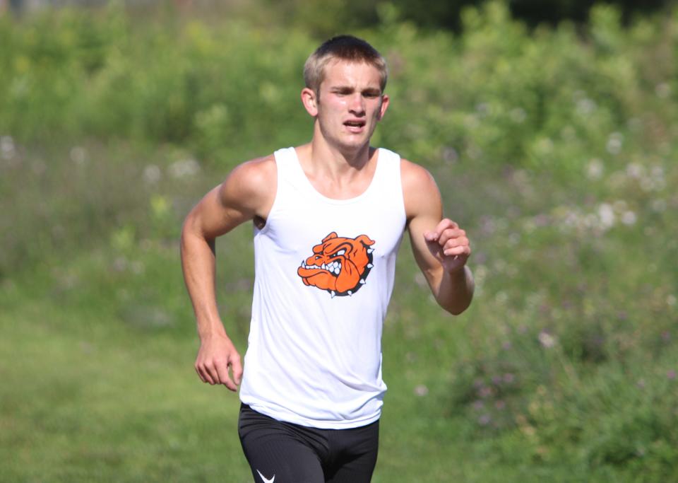 Tyler Langley finished seventh in 15:29.7, leading Brighton to the Division 1 championship at the Portage Invitational.