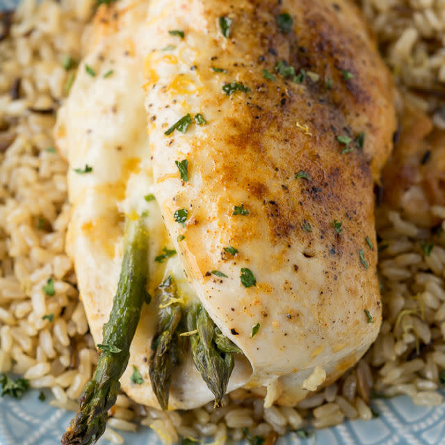 <p>This juicy chicken stuffed with asparagus and a small slice of provolone cheese needs just 8 <a rel="nofollow noopener" href="http://www.redbookmag.com/food-recipes/news/g3692/most-popular-ingredients-according-pinterest/" target="_blank" data-ylk="slk:basic ingredients;elm:context_link;itc:0;sec:content-canvas" class="link ">basic ingredients</a>.</p><p><strong>Get the recipe at <a rel="nofollow noopener" href="http://www.iwashyoudry.com/2017/01/06/asparagus-stuffed-chicken-breast/" target="_blank" data-ylk="slk:I Wash You Dry;elm:context_link;itc:0;sec:content-canvas" class="link ">I Wash You Dry</a>.</strong></p>