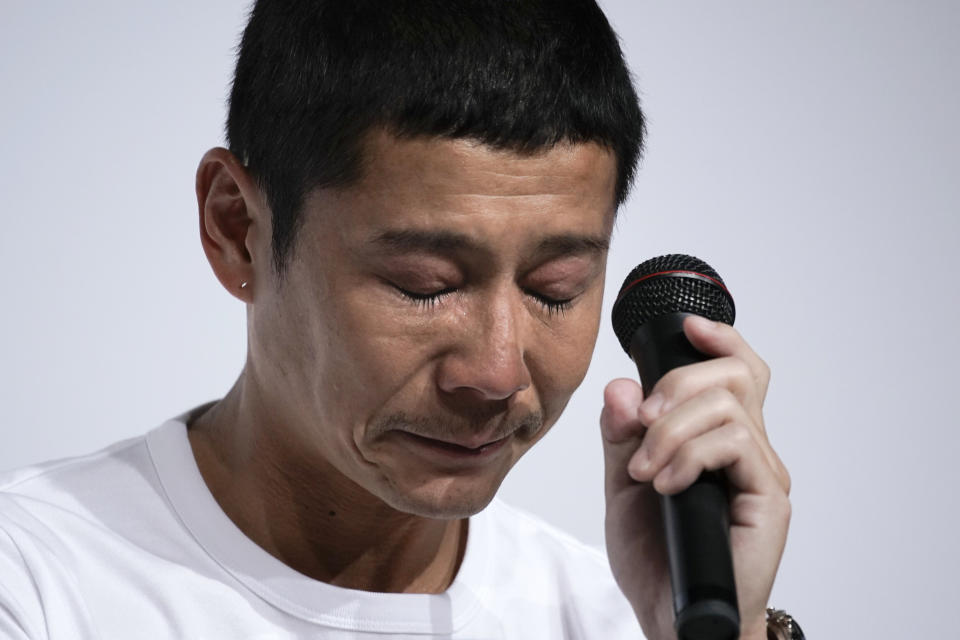 Zozo founder, Yusaku Maezawa, gets teary-eyed during a news conference Thursday, Sept. 12, 2019, in Tokyo. Yahoo Japan Corp. said Thursday it will put up a tender offer, estimated at 400 billion yen ($3.7 billion), for Zozo Inc., a Japanese online retailer started by a celebrity tycoon. (AP Photo/Jae C. Hong)